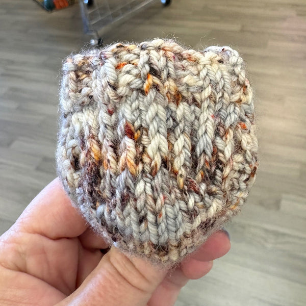 mini knit sock heel and cuff in variegated yarn